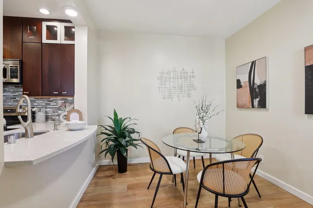 a bathroom with a sink a vanity and a mirror