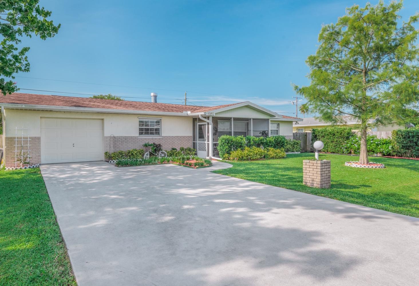 1982 Southeast Jackson Street Stuart, FL 34997 - Photo 2 of 15 FRONT JACKSON