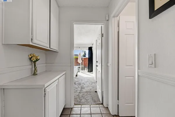 a bathroom with a sink toilet vanity and shower