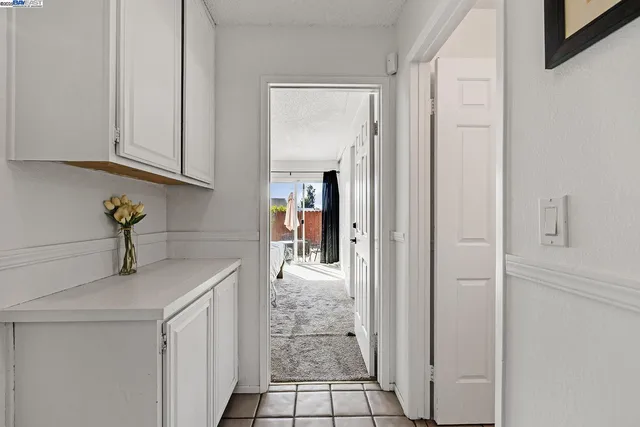 a bathroom with a sink toilet vanity and shower
