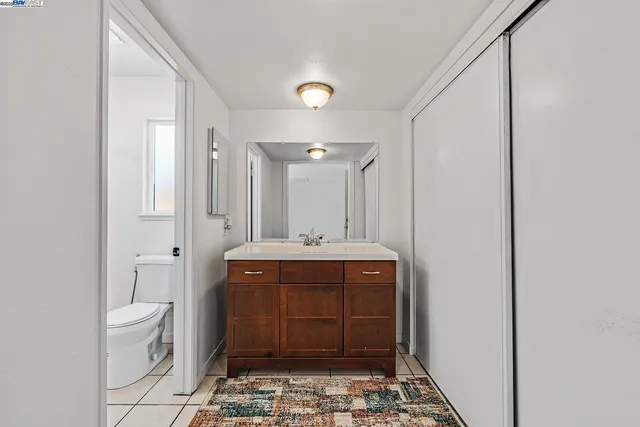 a bathroom with a shower and a toilet