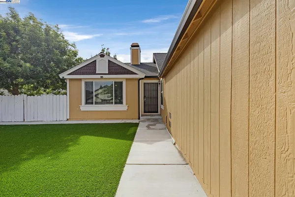 a front view of a house with yard