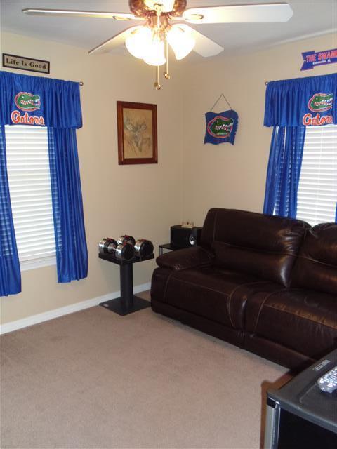 3444 King Lake Road DeFuniak Springs, FL 32433 - Photo 21 of 29 a living room with furniture and a window