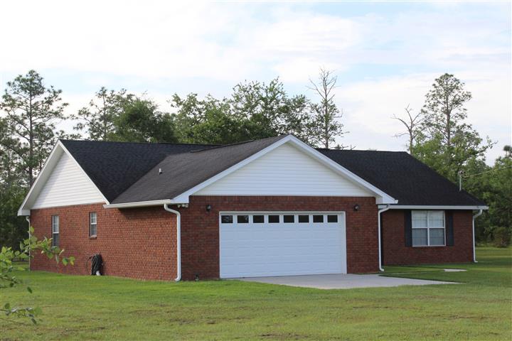 3444 King Lake Road DeFuniak Springs, FL 32433 - Photo 3 of 29 a view of a house with a yard