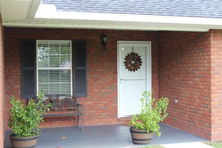 3444 King Lake Road DeFuniak Springs, FL 32433 - Photo 4 of 29 a front view of a house with a chairs