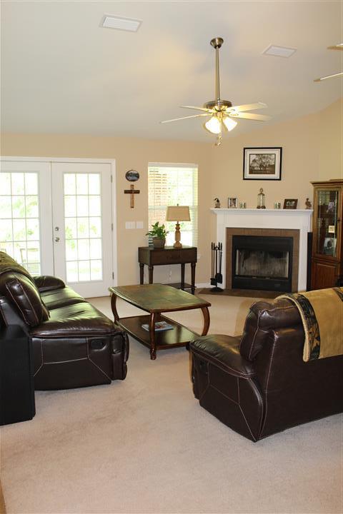 3444 King Lake Road DeFuniak Springs, FL 32433 - Photo 9 of 29 a living room with furniture window and a fireplace