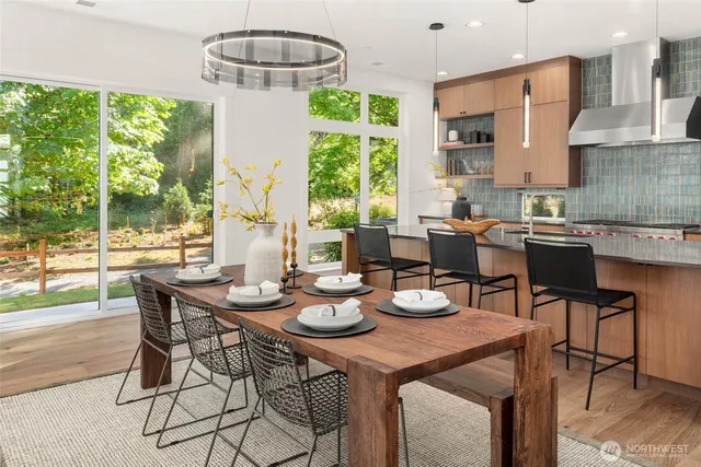 a view of a dining room with furniture window and outside view