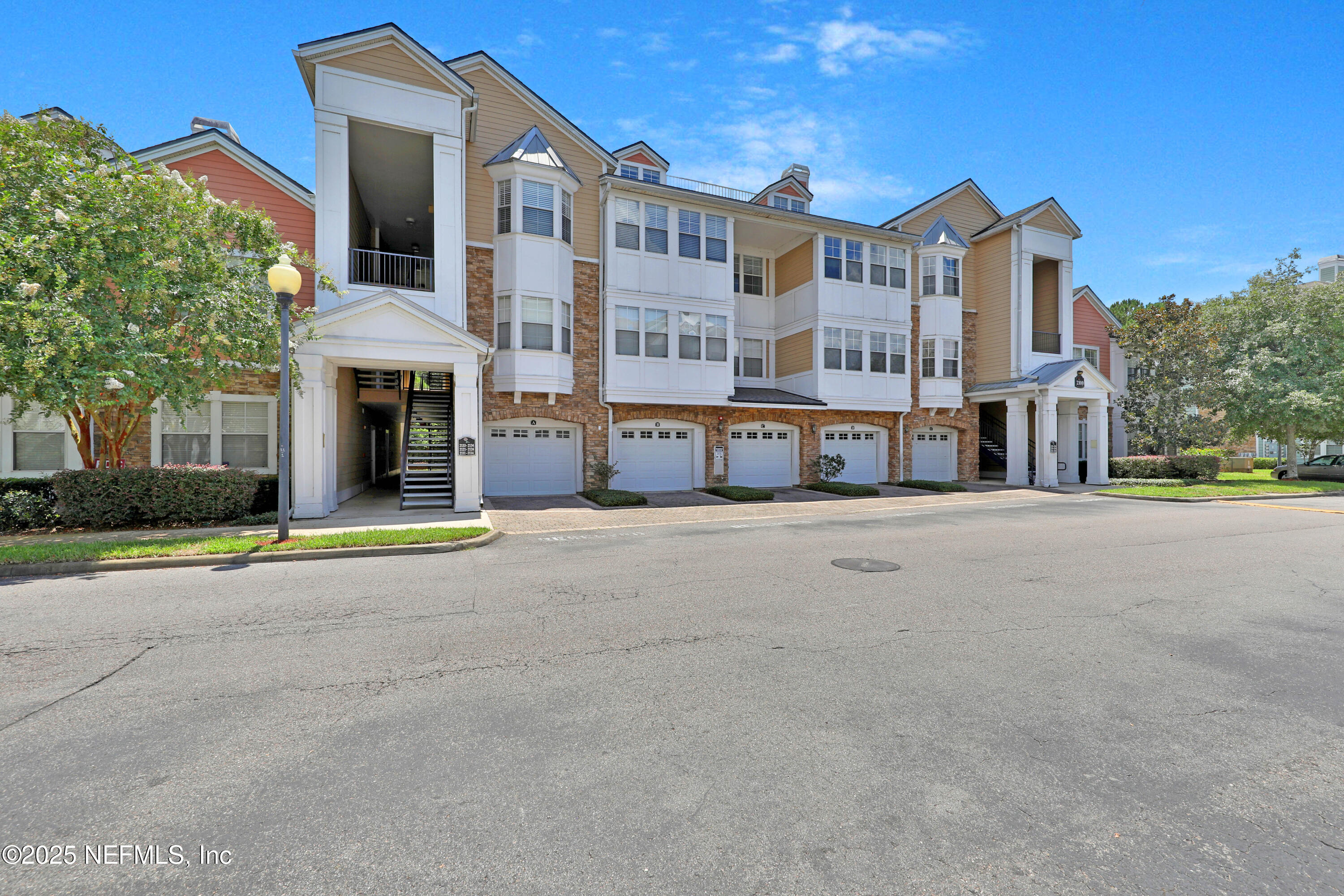 8550 Touchton Road, Unit 2133 Jacksonville, FL 32216 - Photo 20 of 41 a view of building with yard