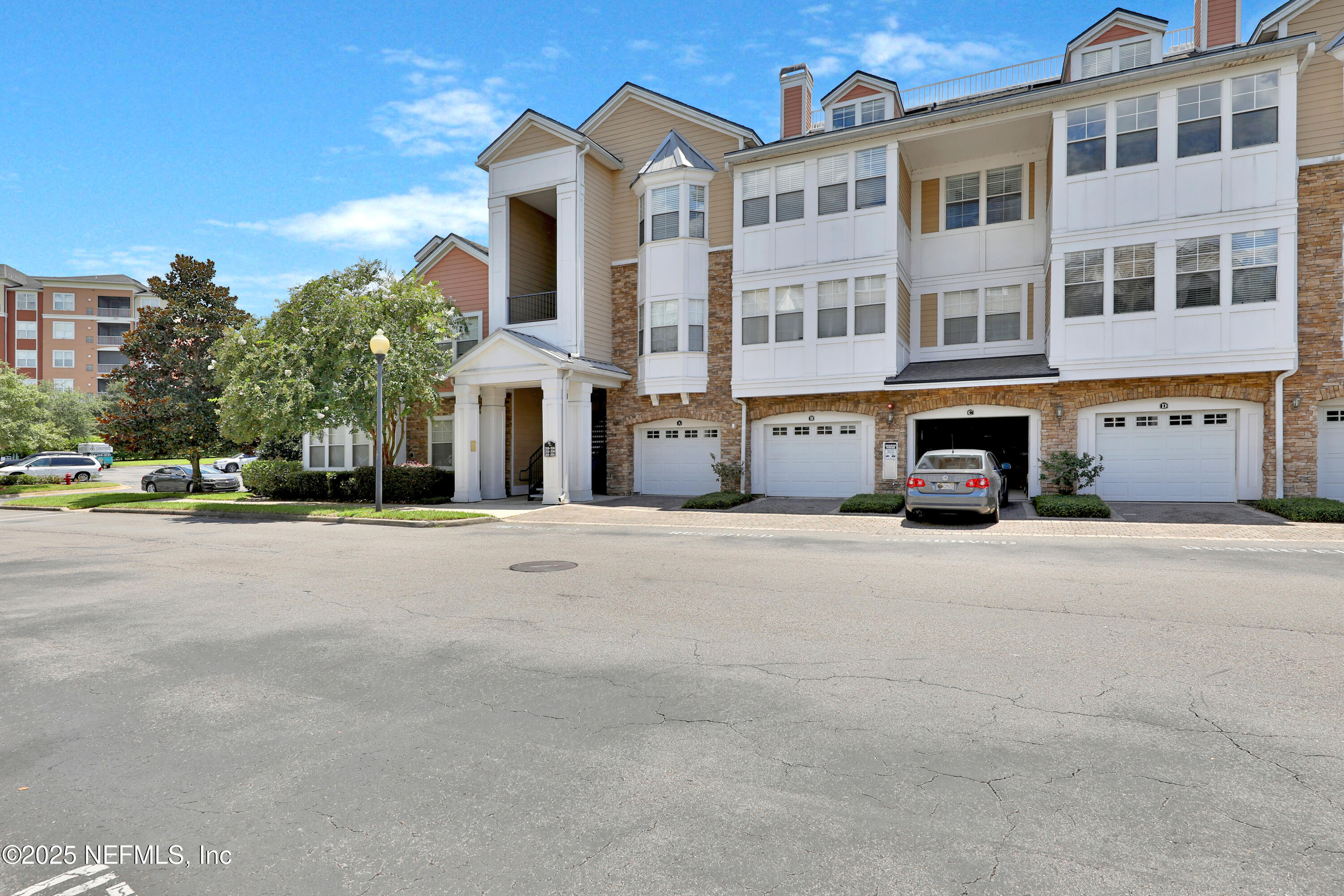 8550 Touchton Road, Unit 2133 Jacksonville, FL 32216 - Photo 21 of 41 a view of multiple houses with a street
