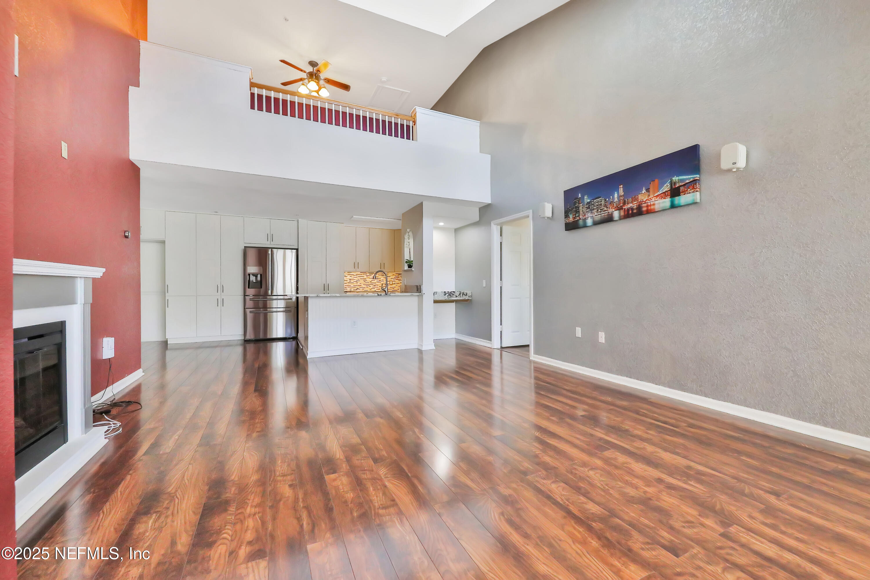 8550 Touchton Road, Unit 2133 Jacksonville, FL 32216 - Photo 6 of 41 a view of empty room with wooden floor