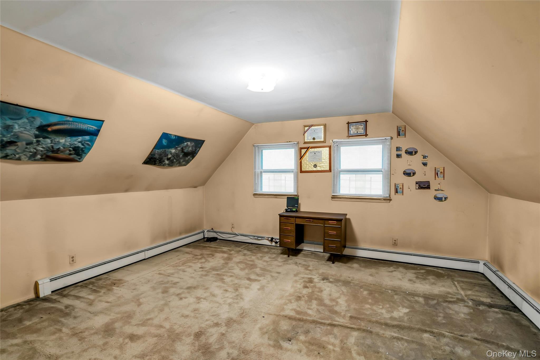 769 Meadow Road Smithtown, NY 11787 - Photo 23 of 27 an empty room with windows