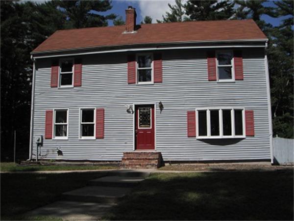 15 Porter Road Rochester, MA 02770 - Photo 1 of 12 a front view of a house with a yard