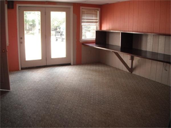 15 Porter Road Rochester, MA 02770 - Photo 11 of 12 a view of an empty room with a window