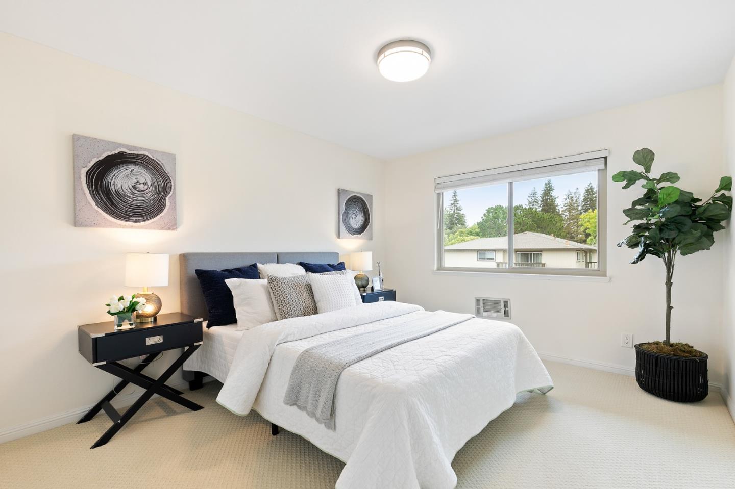 100 East Middlefield Road, Unit 2F Mountain View, CA 94043 - Photo 20 of 29 a bedroom with a bed and a window