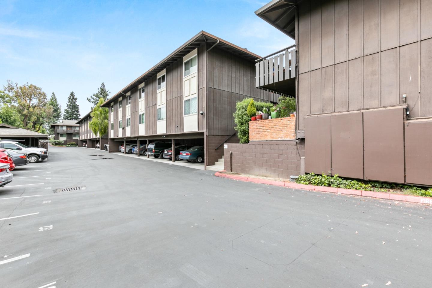 100 East Middlefield Road, Unit 2F Mountain View, CA 94043 - Photo 23 of 29 a view of a street with cars