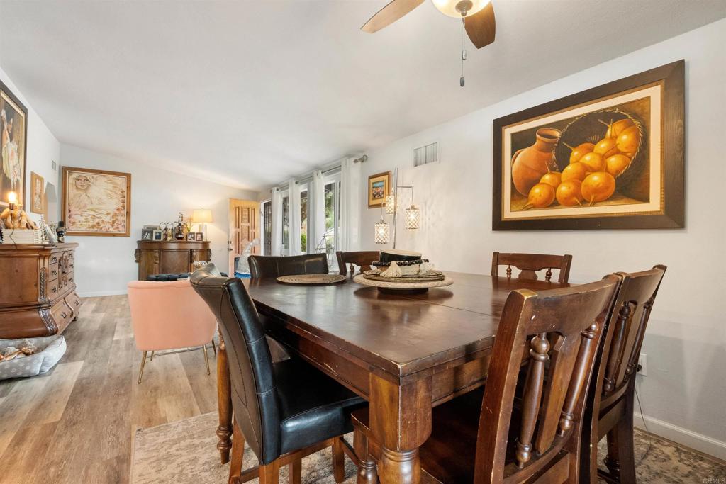 14102 Tobiasson Road Poway, CA 92064 - Photo 13 of 23 a view of a dining room with furniture