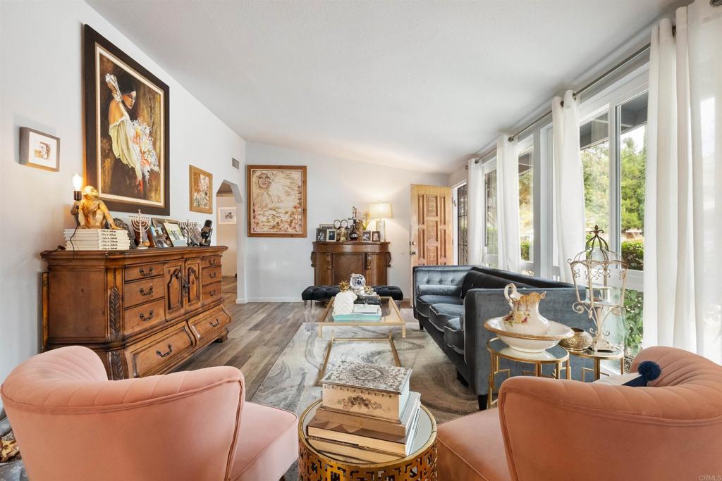 14102 Tobiasson Road Poway, CA 92064 - Photo 14 of 23 a living room with furniture and large windows