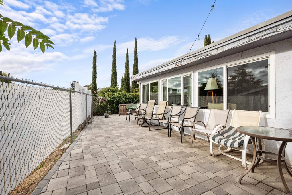 14102 Tobiasson Road Poway, CA 92064 - Photo 17 of 23 a view of a patio with a table and chairs