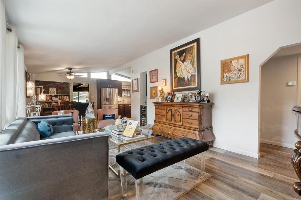 14102 Tobiasson Road Poway, CA 92064 - Photo 5 of 23 a living room with furniture and a wooden floor