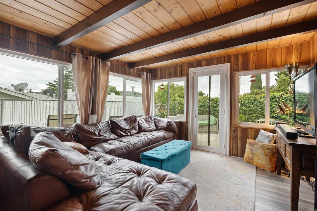 14102 Tobiasson Road Poway, CA 92064 - Photo 8 of 23 a living room with furniture and a large window