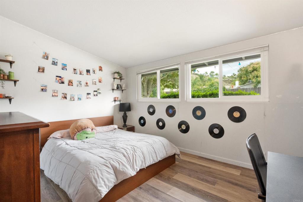 14102 Tobiasson Road Poway, CA 92064 - Photo 10 of 23 a bedroom with a bed and a window