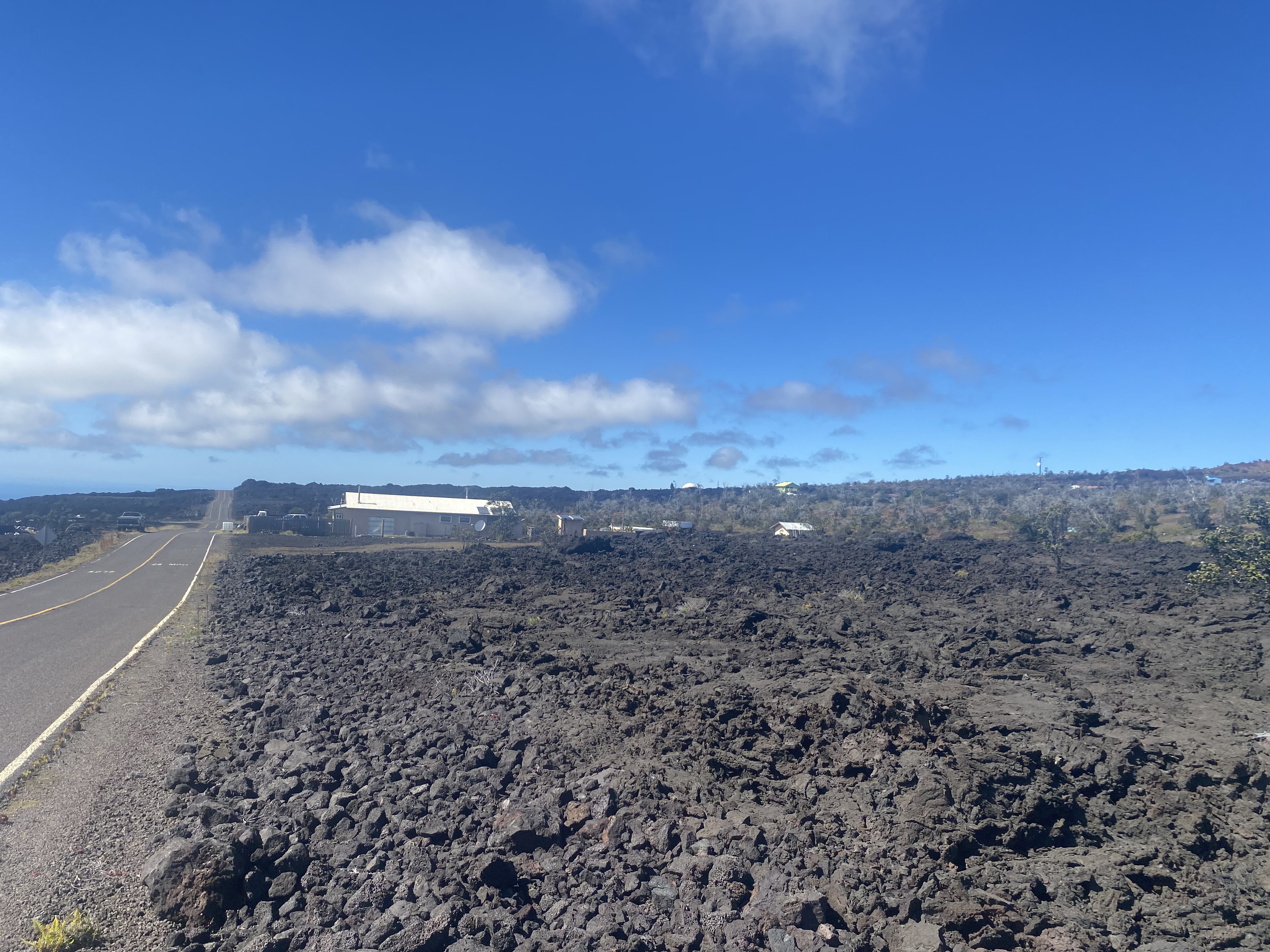 21 Lot Ocean View Ocean View, HI 96704 - Photo 2 of 8 a view of a dry yard with wooden fence