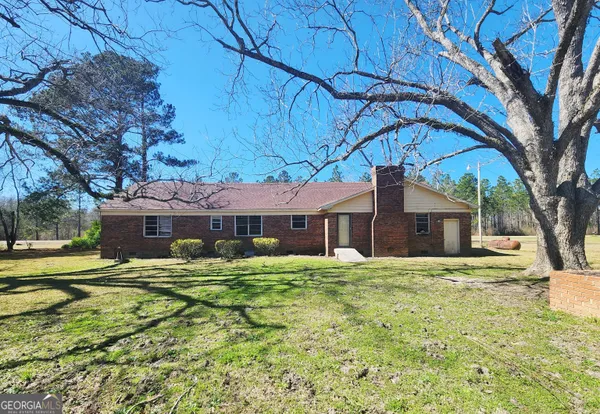 a house view with a garden space