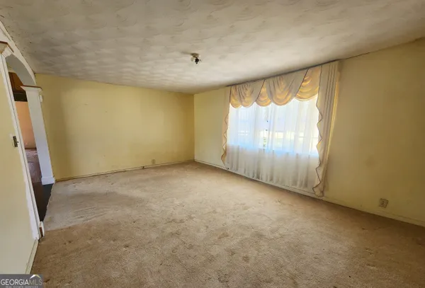 an empty room with a window