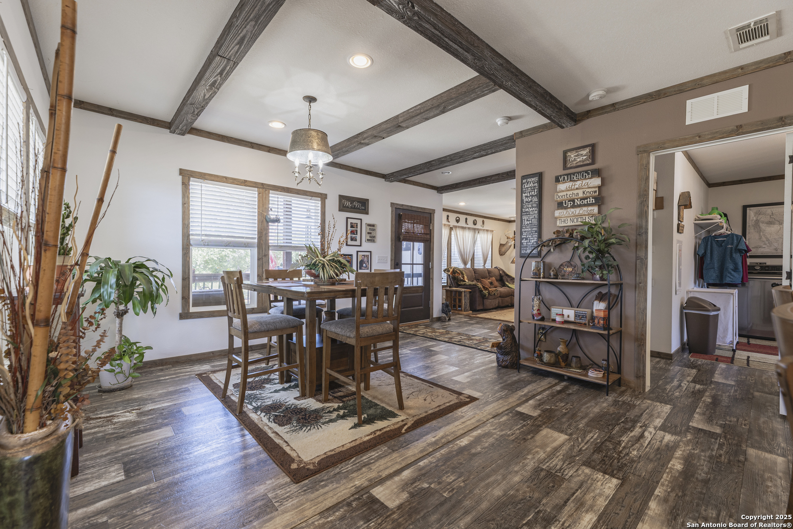 451 Pr 1505 Bandera, TX 78003 - Photo 19 of 43 a view of a dining room with furniture window and wooden floor