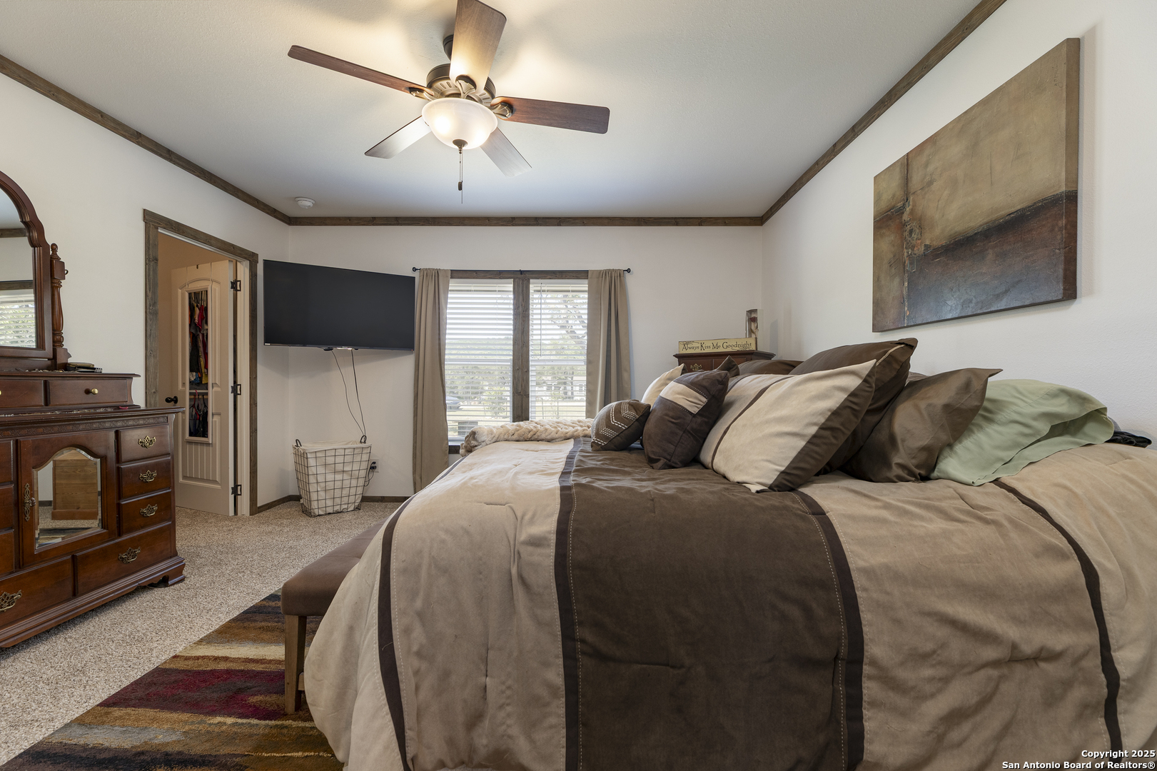 451 Pr 1505 Bandera, TX 78003 - Photo 25 of 43 a bed room with a bed and a television
