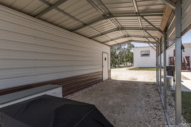 a view of a back yard of the house