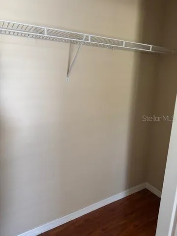 a view of a room with racks on the wall