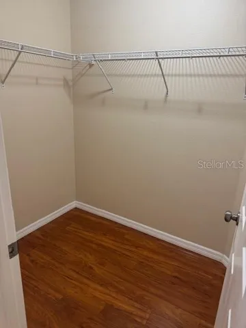 a view of a room with racks on the wall