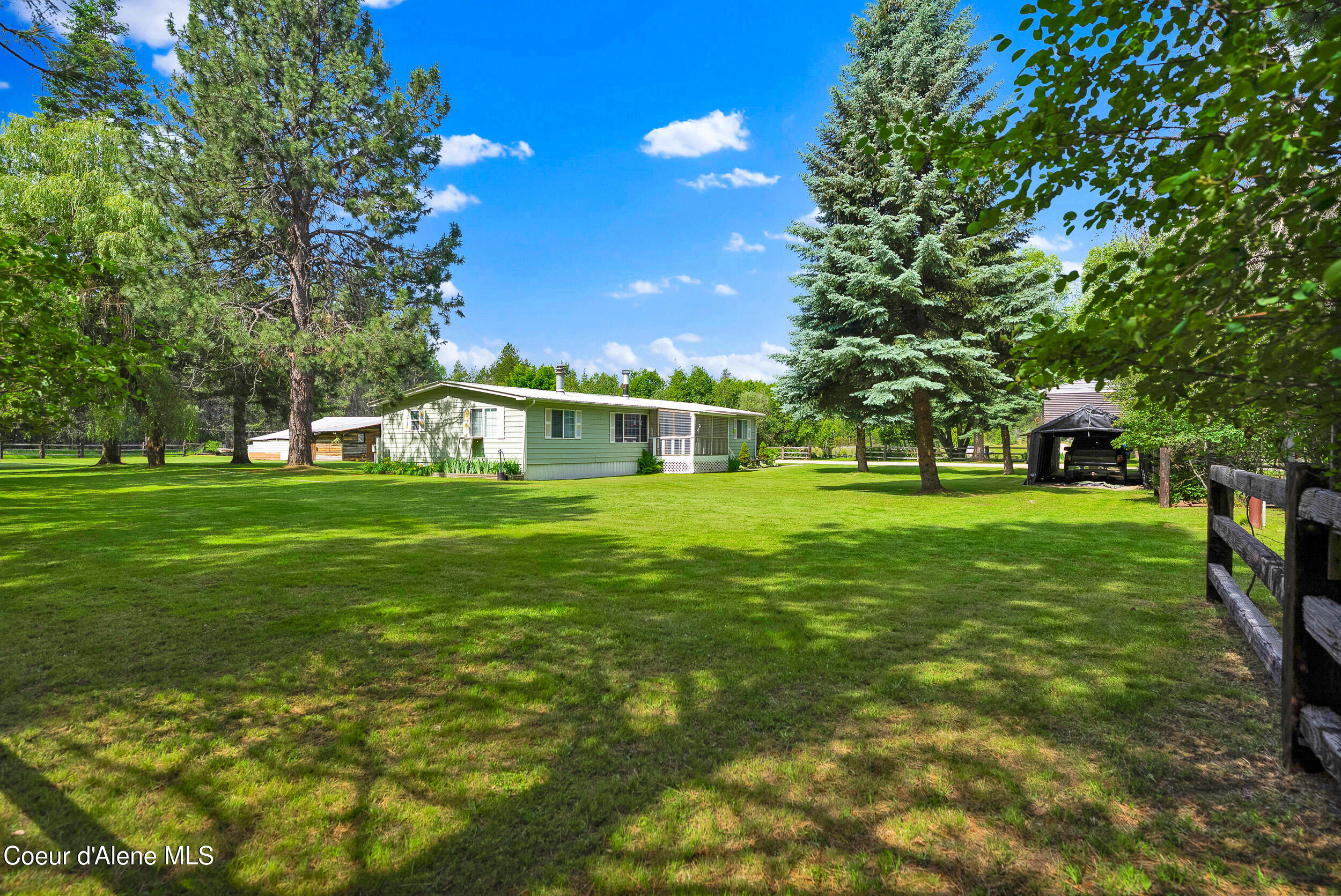 443 Herrmann Lake Road Sagle, ID 83860 - Photo 32 of 47 45 - Herrmann Lake Nlawn2