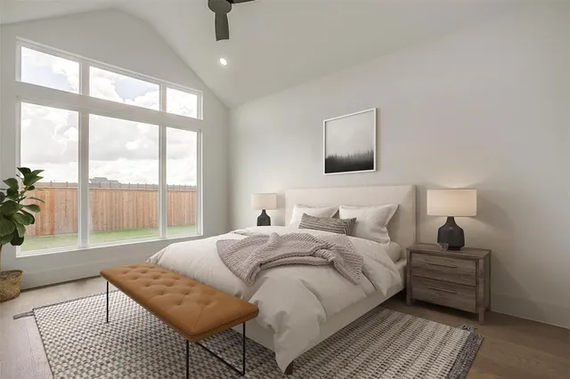 a bedroom with a bed and glass window