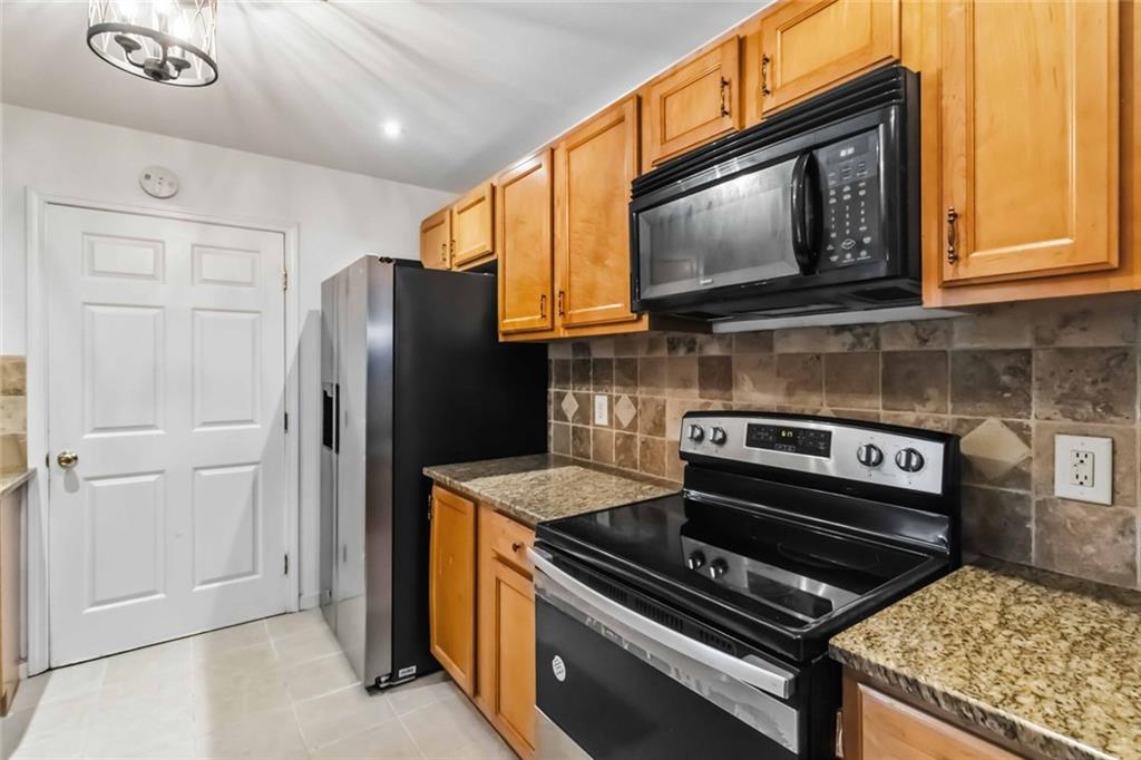 3290 Stonewall Tell Road Atlanta, GA 30349 - Photo 31 of 43 Gallery Image 31