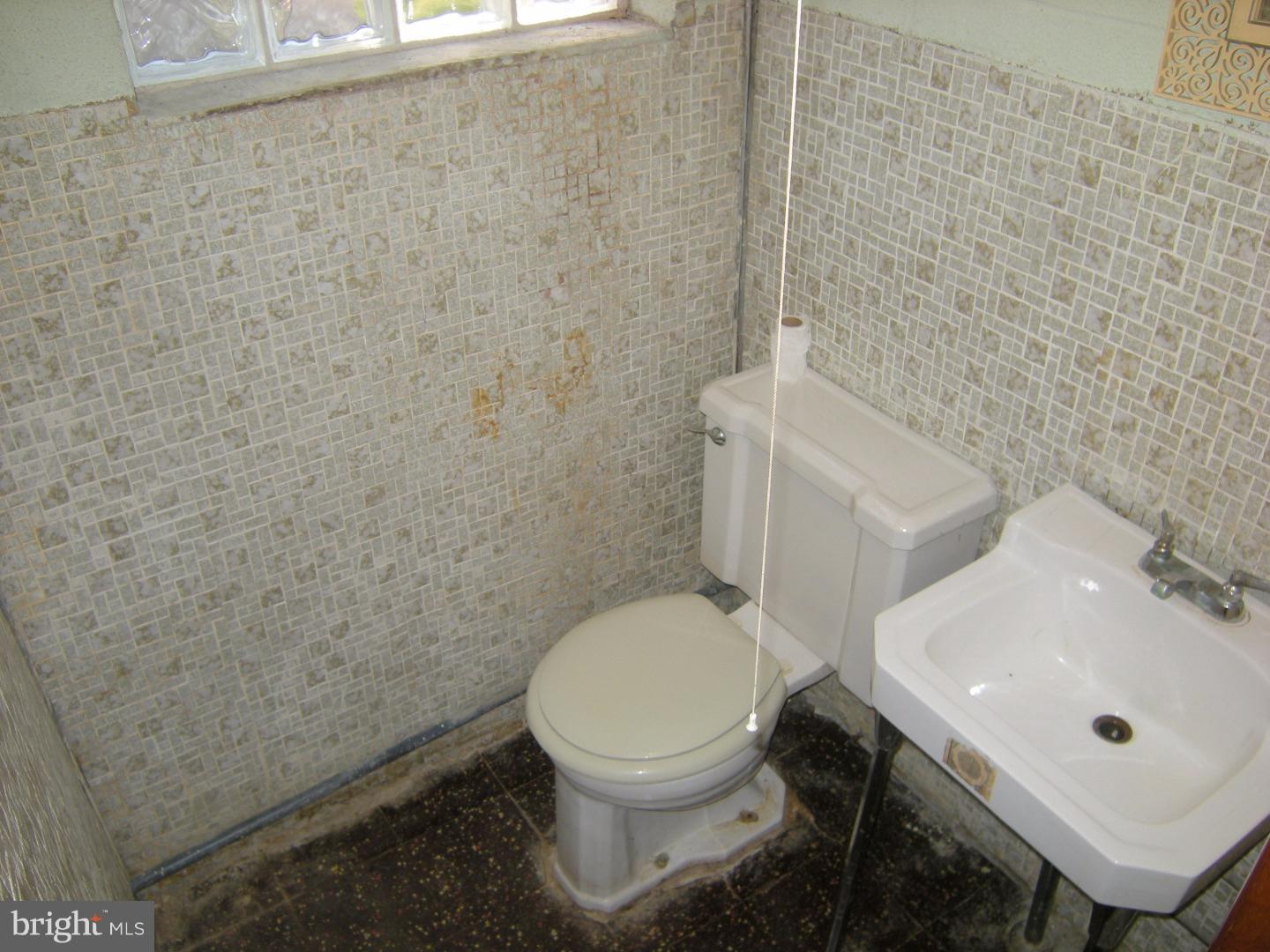 8807 Blue Grass Road Philadelphia, PA 19152 - Photo 21 of 25 Half Bath