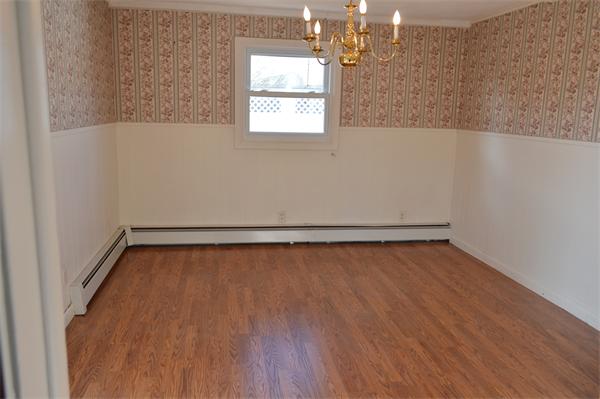 25 Wedgemere Road Beverly, MA 01915 - Photo 16 of 22 a view of a room with wooden floor and small space