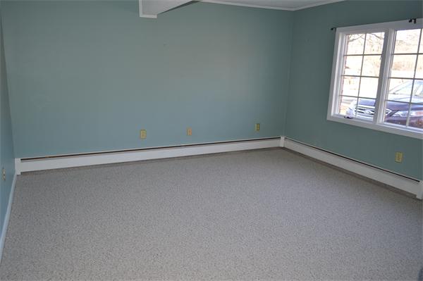 25 Wedgemere Road Beverly, MA 01915 - Photo 18 of 22 an empty room with a window