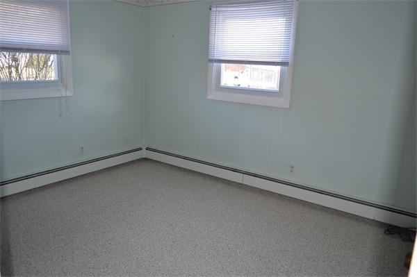25 Wedgemere Road Beverly, MA 01915 - Photo 19 of 22 an empty room with windows