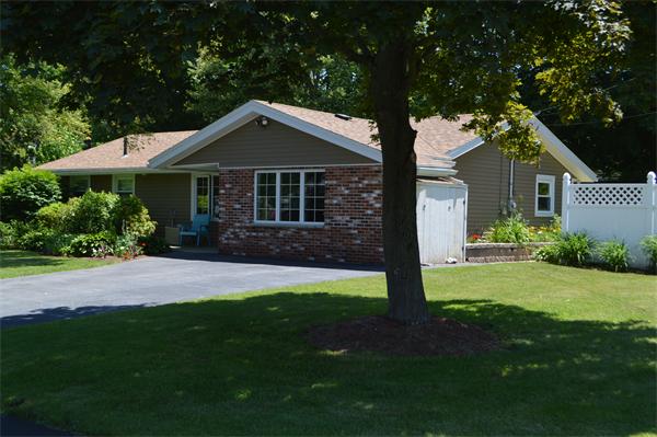 25 Wedgemere Road Beverly, MA 01915 - Photo 2 of 22 a front view of a house with garden