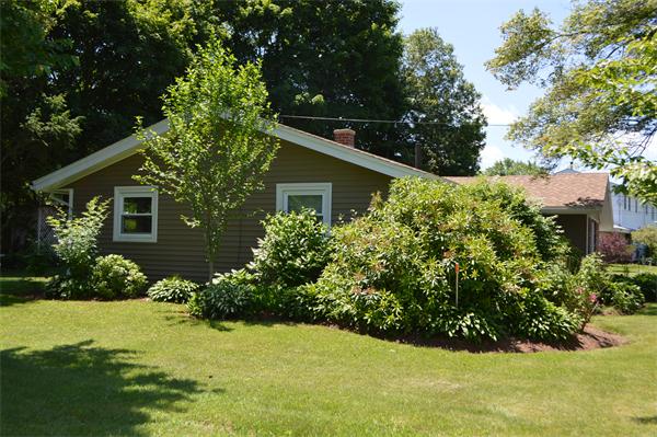 25 Wedgemere Road Beverly, MA 01915 - Photo 4 of 22 a view of backyard with potted plants and large tree