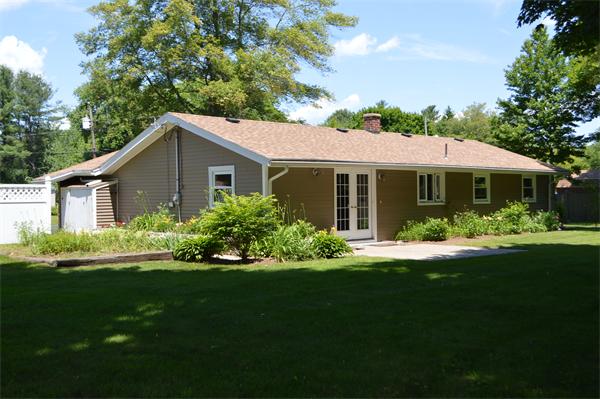 25 Wedgemere Road Beverly, MA 01915 - Photo 5 of 22 a front view of a house with a yard and green space