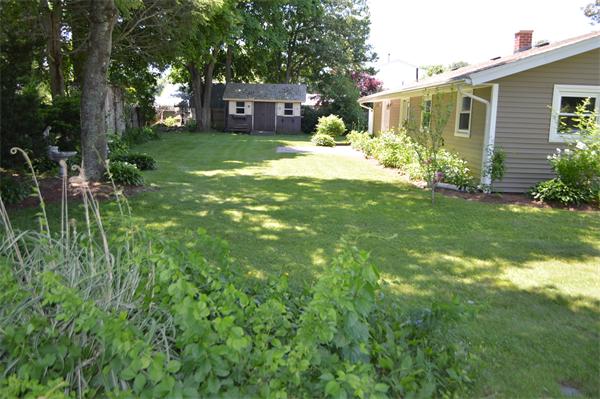 25 Wedgemere Road Beverly, MA 01915 - Photo 8 of 22 a view of a yard in front of house