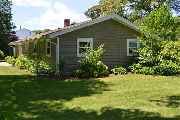 25 Wedgemere Road Beverly, MA 01915 - Photo 9 of 22 a front view of house with yard and green space
