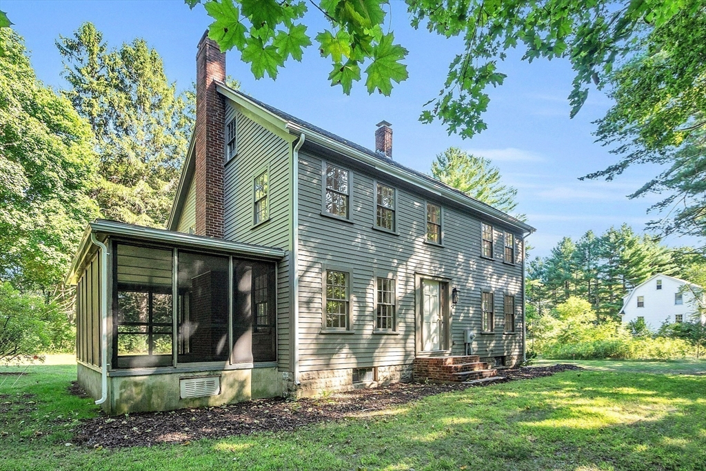 681 Barretts Mill Road Concord, MA 01742 - Photo 1 of 27 front view of a house with a yard