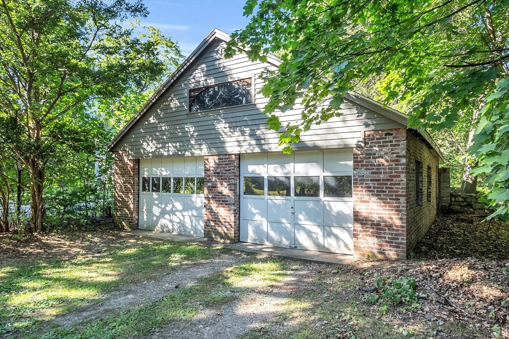 681 Barretts Mill Road Concord, MA 01742 - Photo 24 of 27 a view of a yard in front of house