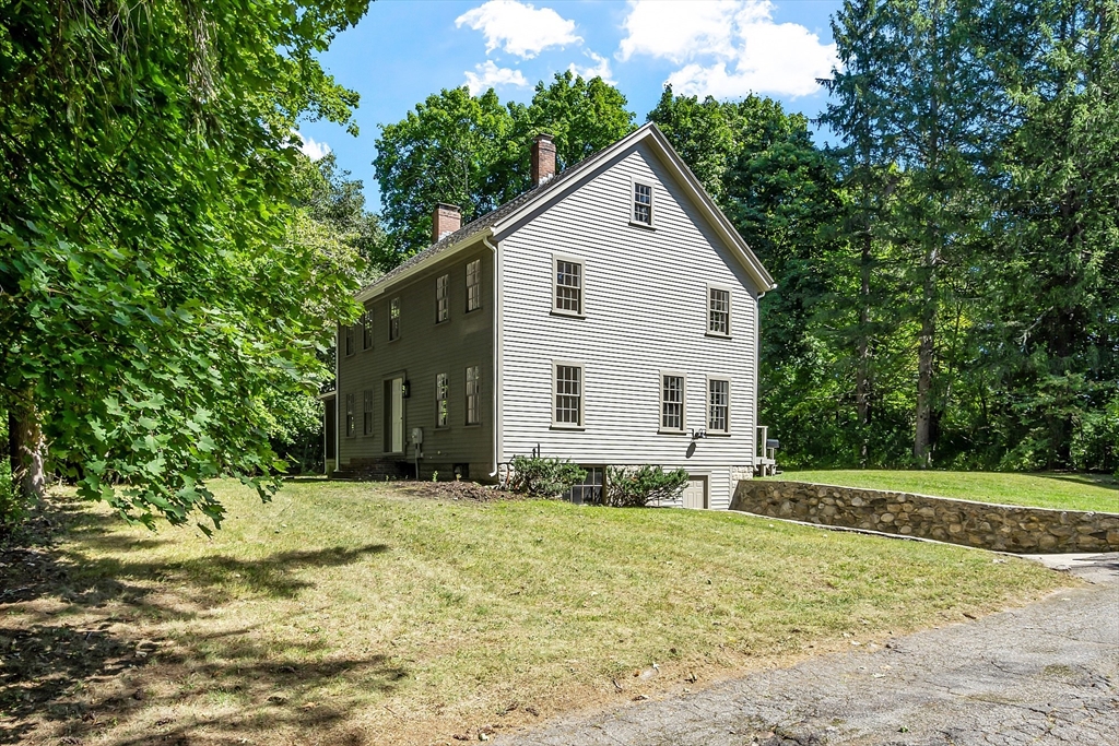 681 Barretts Mill Road Concord, MA 01742 - Photo 27 of 27 a view of a house with yard and a tree