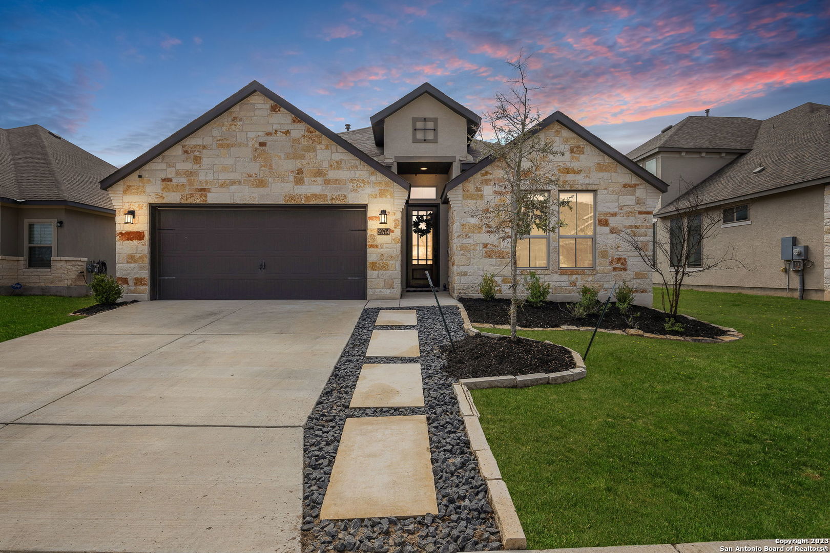 29744 Elkhorn Ridge Fair Oaks Ranch, TX 78015 - Photo 1 of 1 a front view of a house with garden