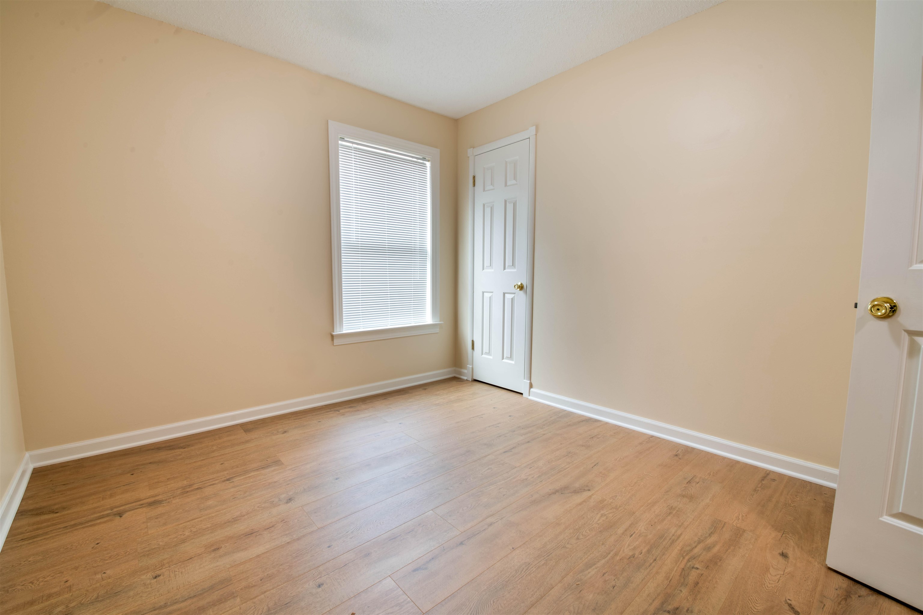 1642 Brierbrook Road Germantown, TN 38138 - Photo 27 of 37 bedroom featuring light wood-style floors and baseboards